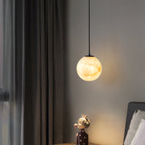 Lampada sospesa in marmo sferico
