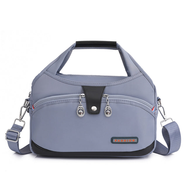 Sac à main WanderChic bleu clair en bretelles réglables et protection antivol pour femmes